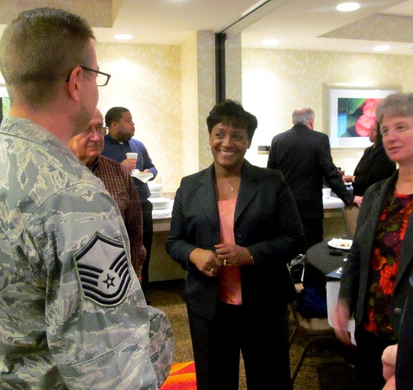 Miller (c) chapters with attendees after the chapter�s final Business Over Breakfast event of 2012 held in December.